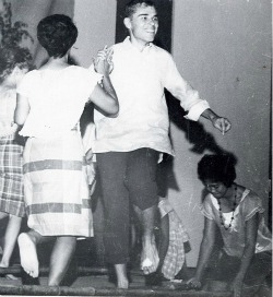 Terry Marshall and Alma Aletin dancing the Tinikling